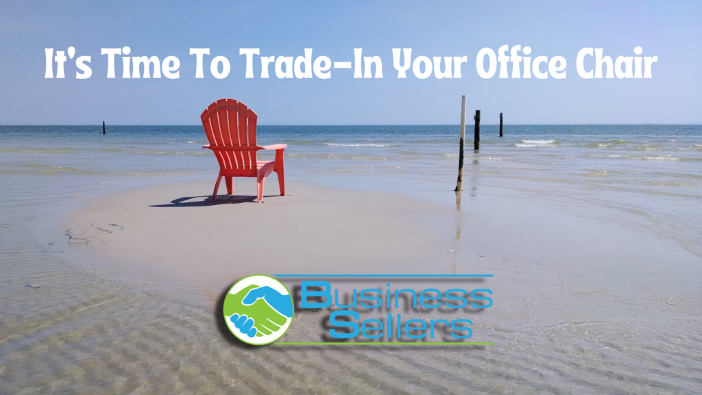 chair on beach surrounded by clear blue water with the text "its time to trace-in your office chair" with the business sellers logo